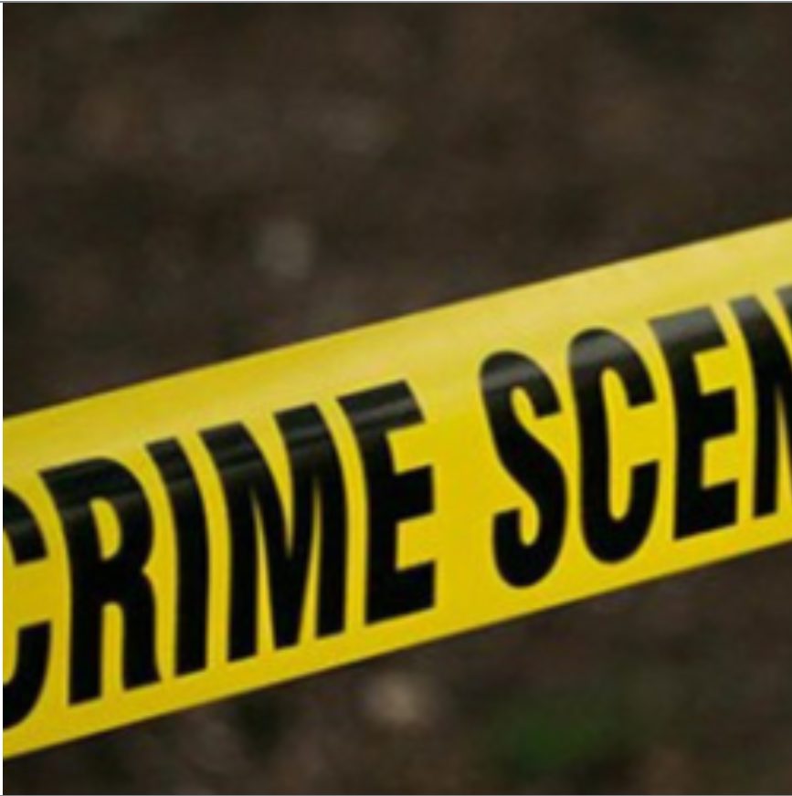 Yellow crime scene tape with black text reading 'CRIME SCENE'.