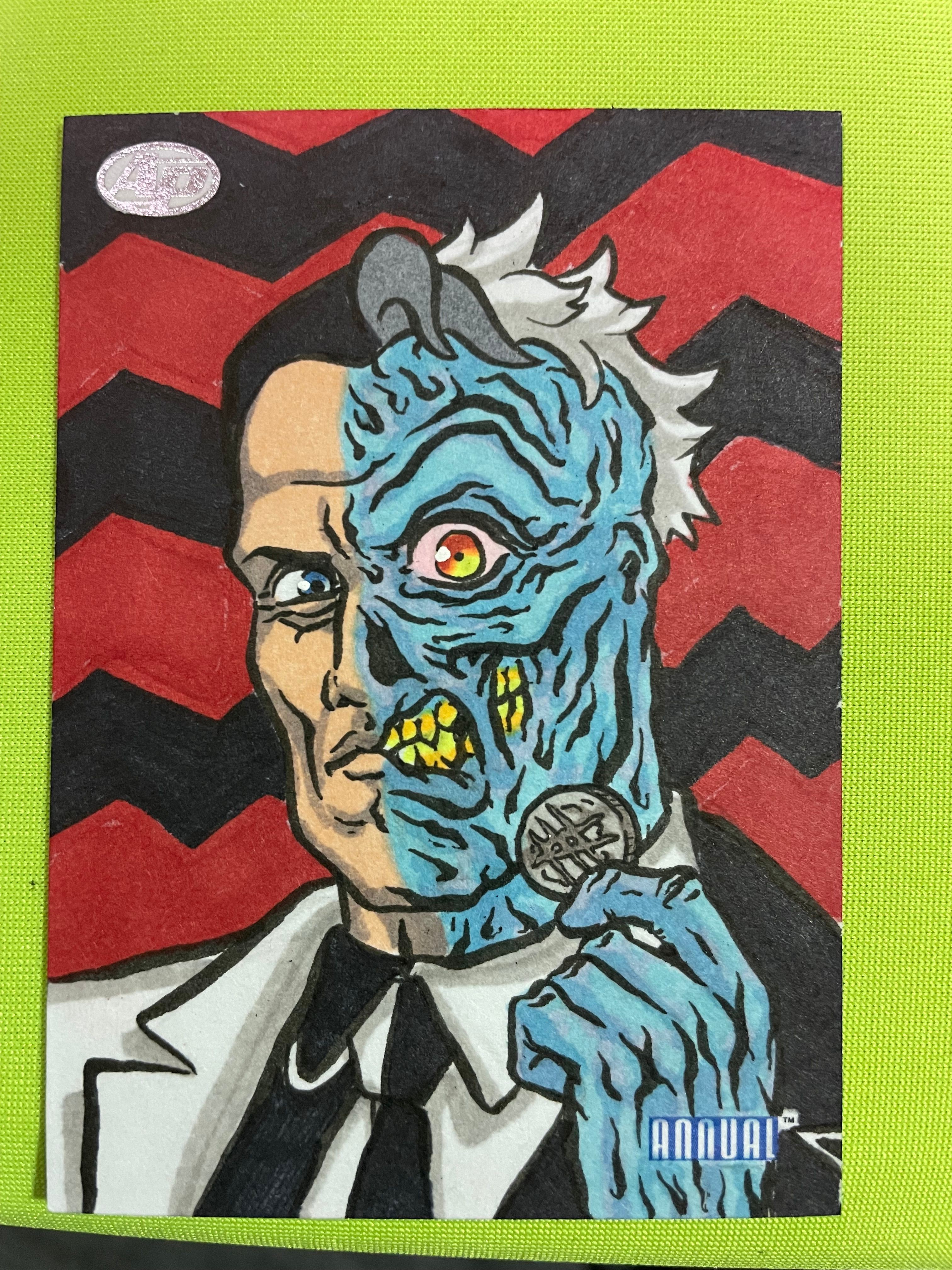 Colorful illustration of a blue tiger with a yellow nose, wearing a white jacket, against a red and black zigzag background.